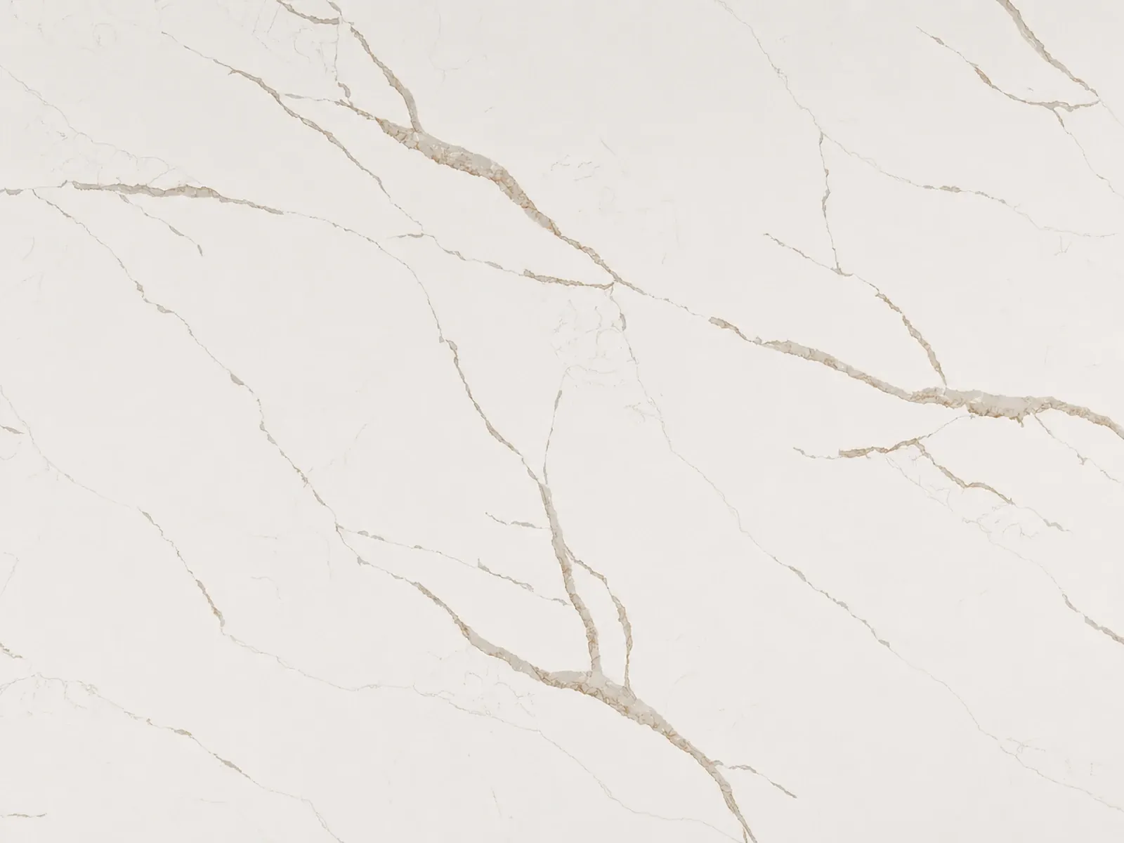 Calacatta Laza Oro quartz surface with warm gold veining